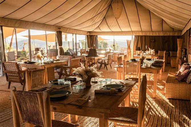 Luxurious private Berber camp in Agafay Desert with comfortable seating and decor